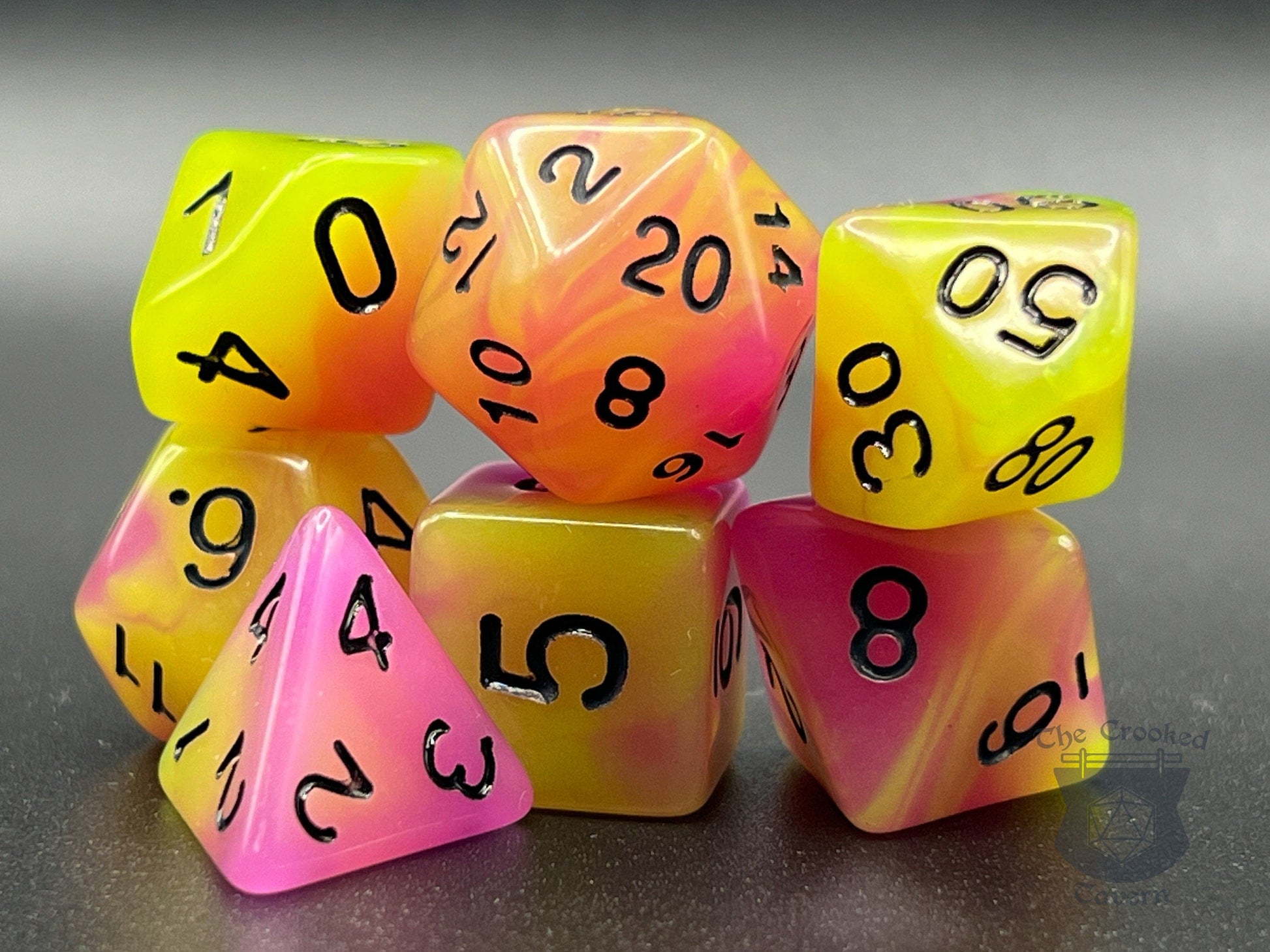 The Crooked Tavern Glow in the Dark RPG Dice Set | Pink/Yellow Polyhedral RPG Dice