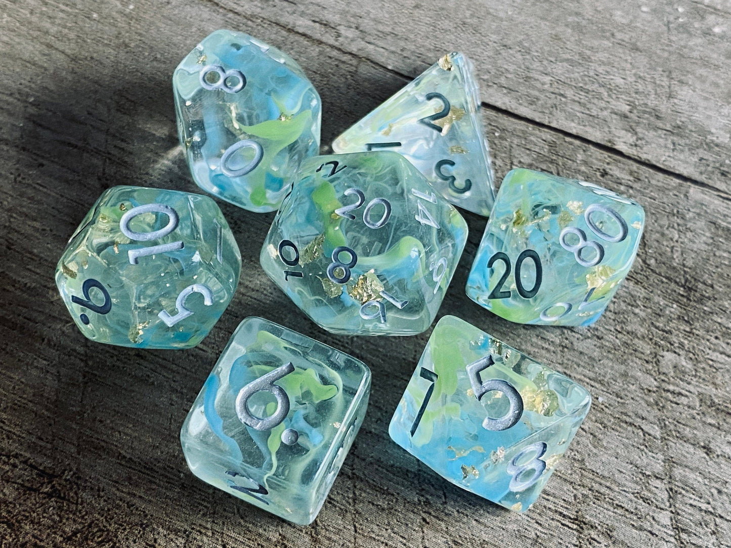 The Crooked Tavern Dice Sets Flotsam RPG Dice Set | Swirling Aqua Colors with Gold Flakes Inside!