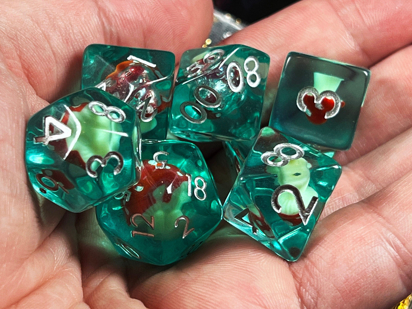 The Crooked Tavern Dice Sets Toadstool RPG Dice Set | Blue Resin with a toadstool inside!