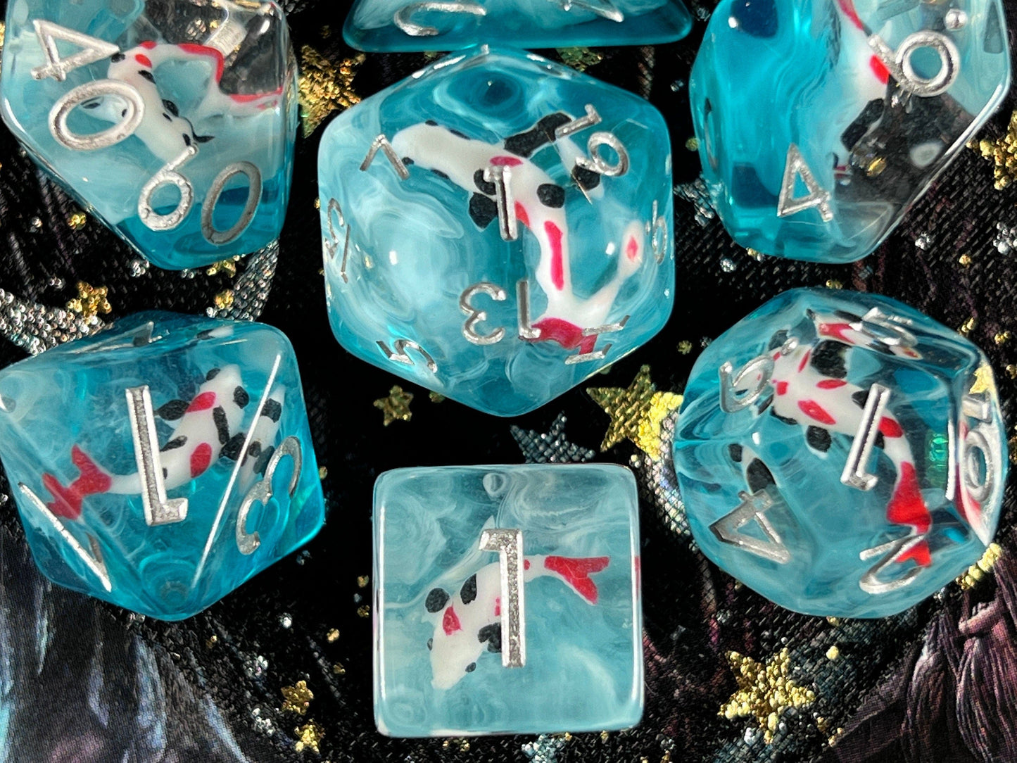 The Crooked Tavern Dice Sets Topaz Koi Fish RPG Dice Set | Red and Black Koi Fish with Swirling Blue Resin