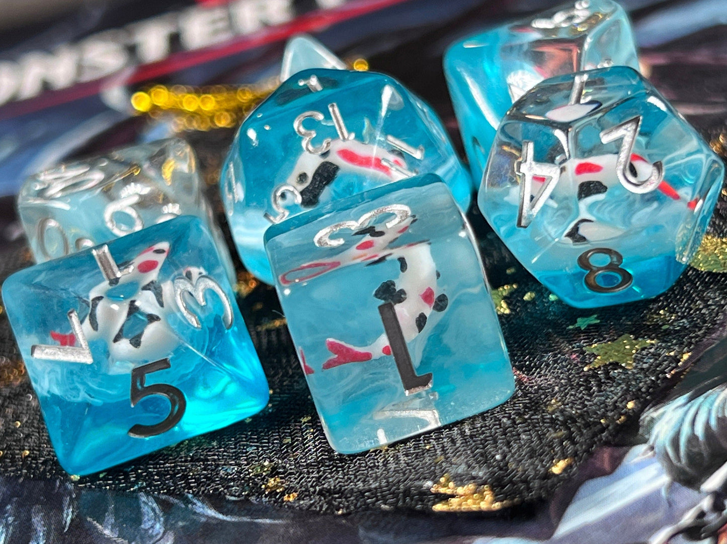 The Crooked Tavern Dice Sets Topaz Koi Fish RPG Dice Set | Red and Black Koi Fish with Swirling Blue Resin