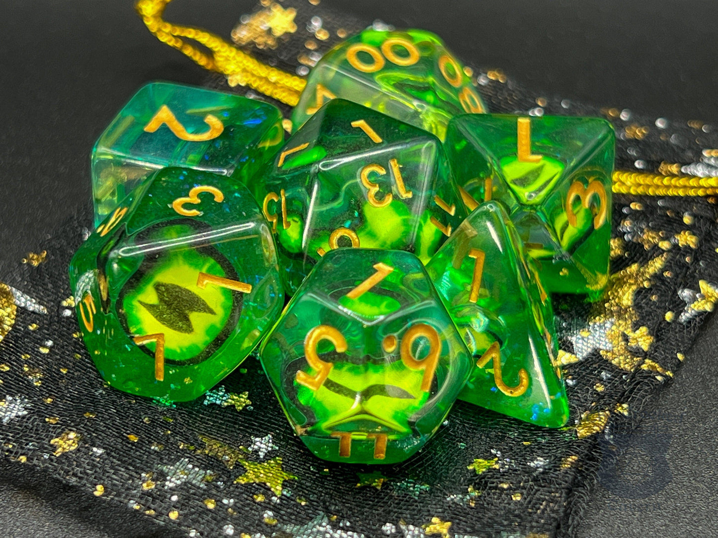 The Crooked Tavern Bag of Eyes RPG Dice Set | Green Eyes and Gold Numbers