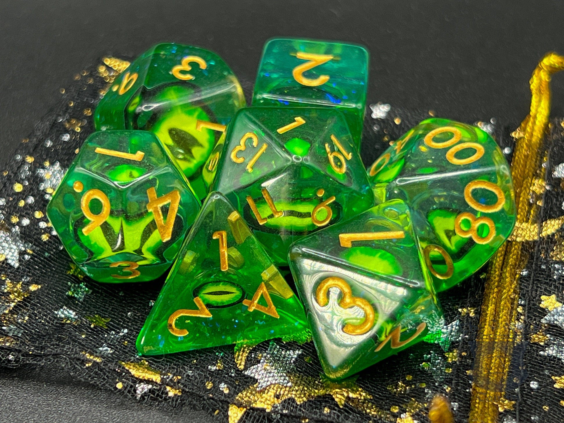 The Crooked Tavern Dice Sets Bag of Eyes RPG Dice Set | Green Eyes and Gold Numbers
