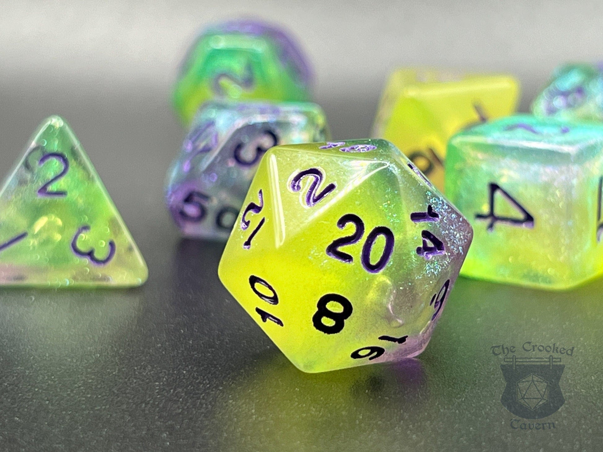 The Crooked Tavern Dice Sets Glow in the Dark RPG Dice Set | Purple/Green Polyhedral RPG Dice