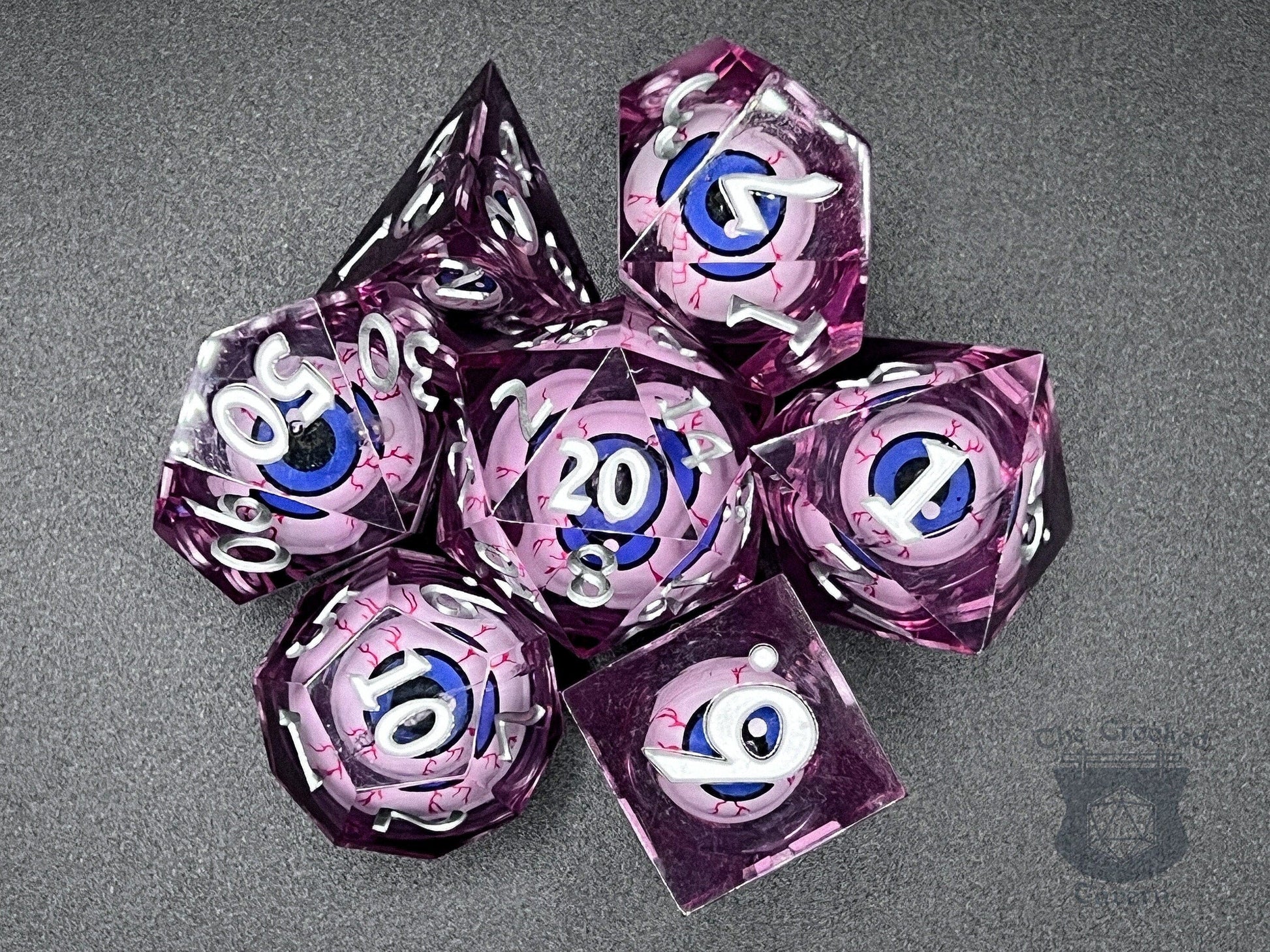 The Crooked Tavern Floating Eyeball Liquid Core RPG Dice Set | Purple/Bloodshot