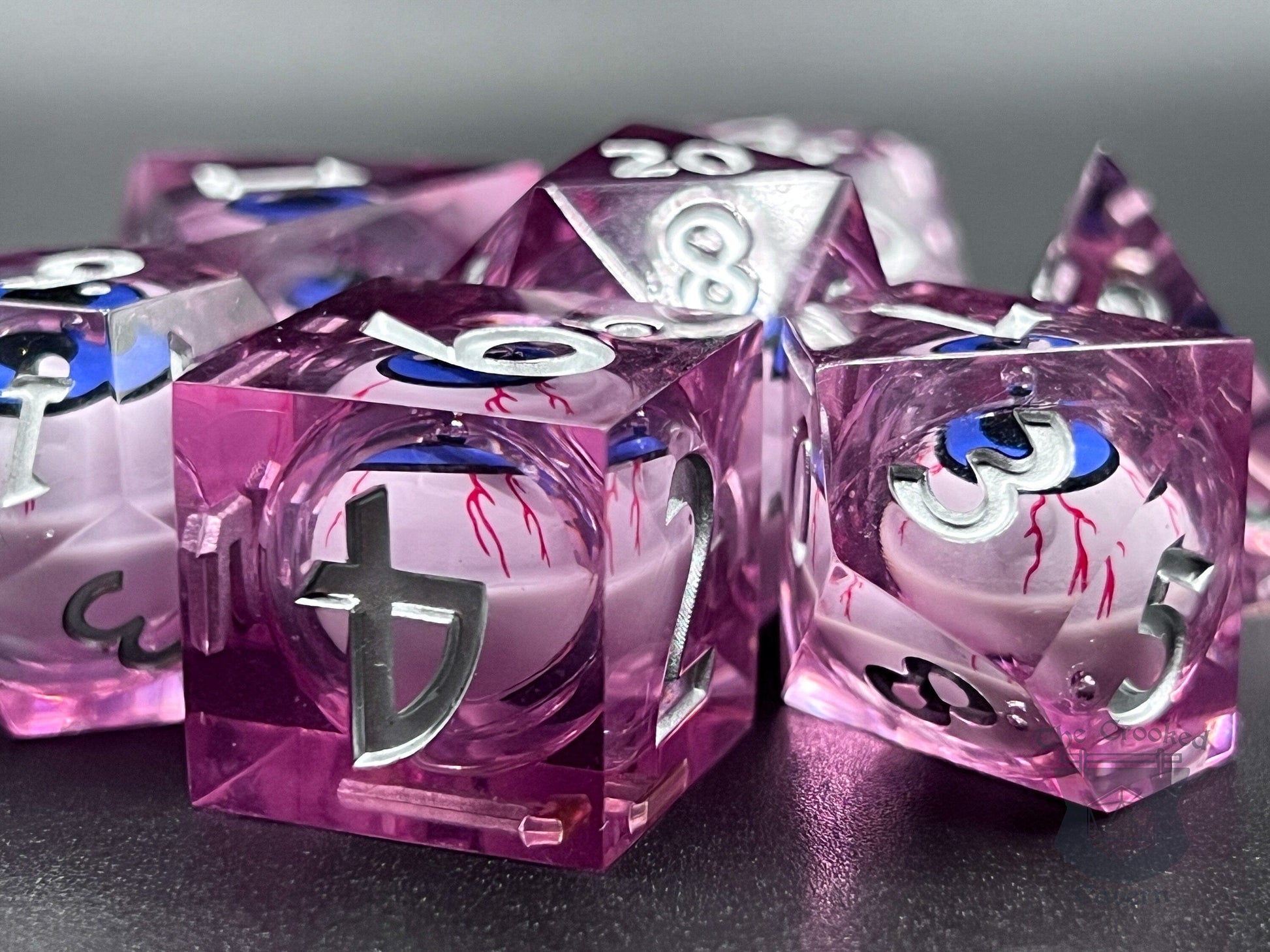 The Crooked Tavern Floating Eyeball Liquid Core RPG Dice Set | Purple/Bloodshot