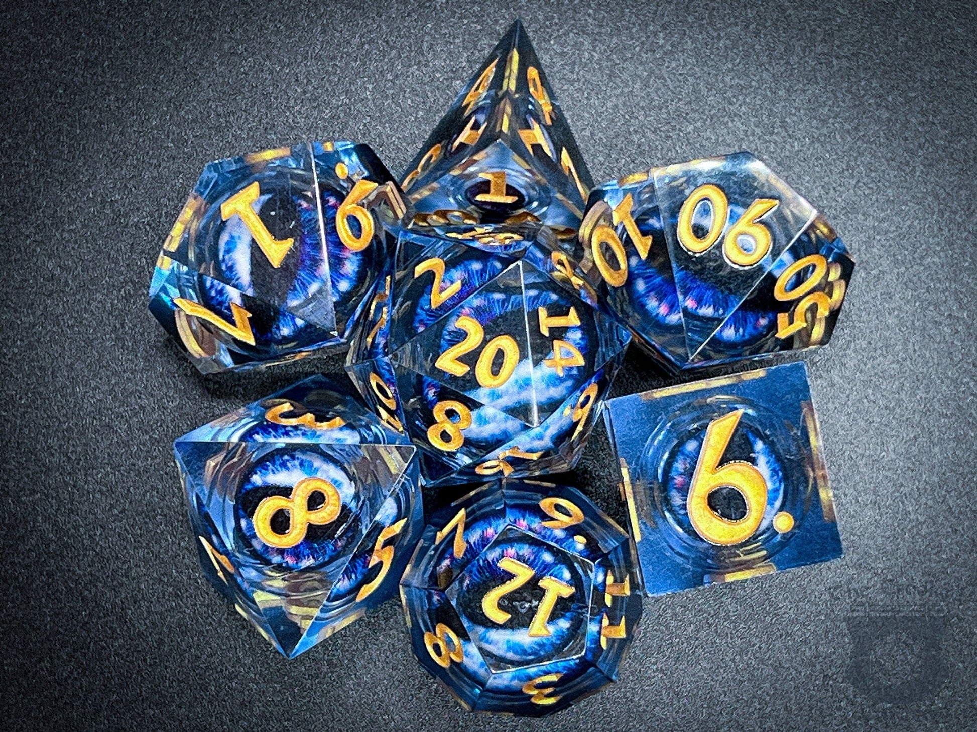 The Crooked Tavern Handmade Dice Sets Floating Eye Liquid Core RPG Dice Set | Blue/Gold