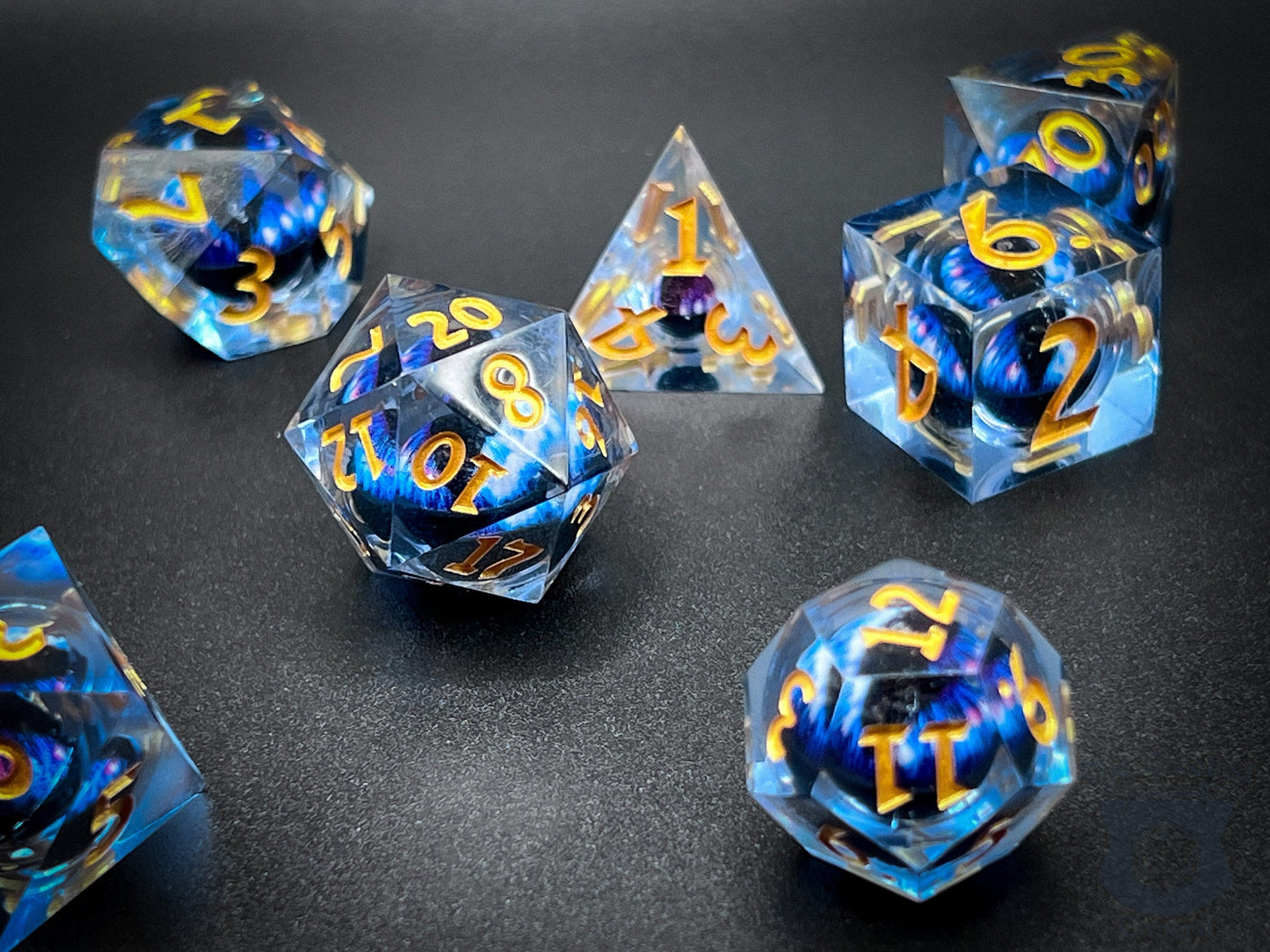 The Crooked Tavern Handmade Dice Sets Floating Eye Liquid Core RPG Dice Set | Blue/Gold