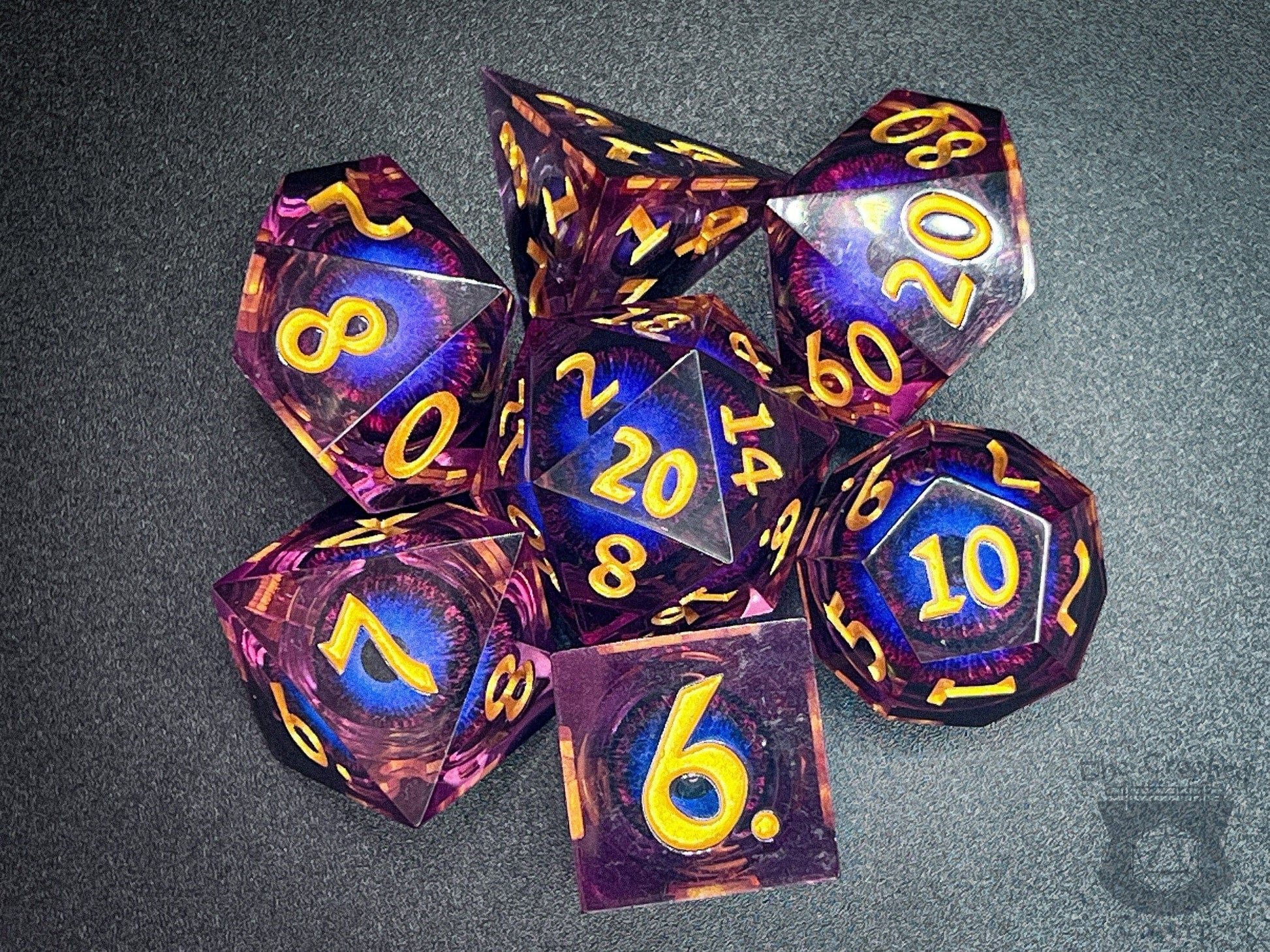 The Crooked Tavern Handmade Dice Sets Floating Eye Liquid Core RPG Dice Set | Purple/Gold