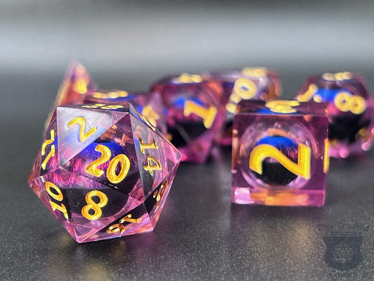 The Crooked Tavern Handmade Dice Sets Floating Eye Liquid Core RPG Dice Set | Purple/Gold