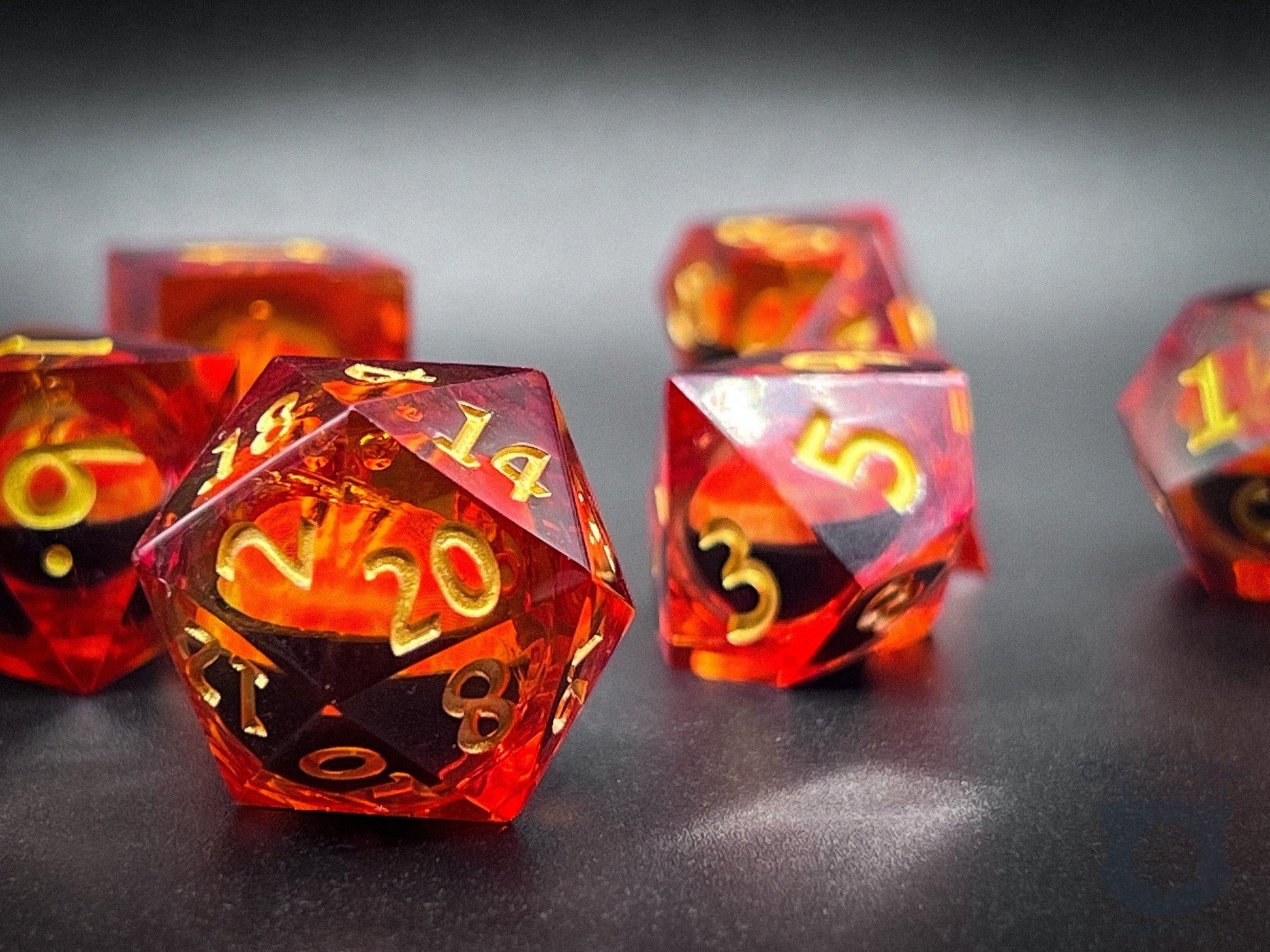 The Crooked Tavern Handmade Dice Sets Floating Eye Liquid Core RPG Dice Set | Red/Gold