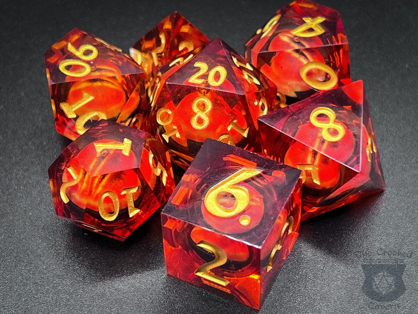 The Crooked Tavern Handmade Dice Sets Floating Eye Liquid Core RPG Dice Set | Red/Gold