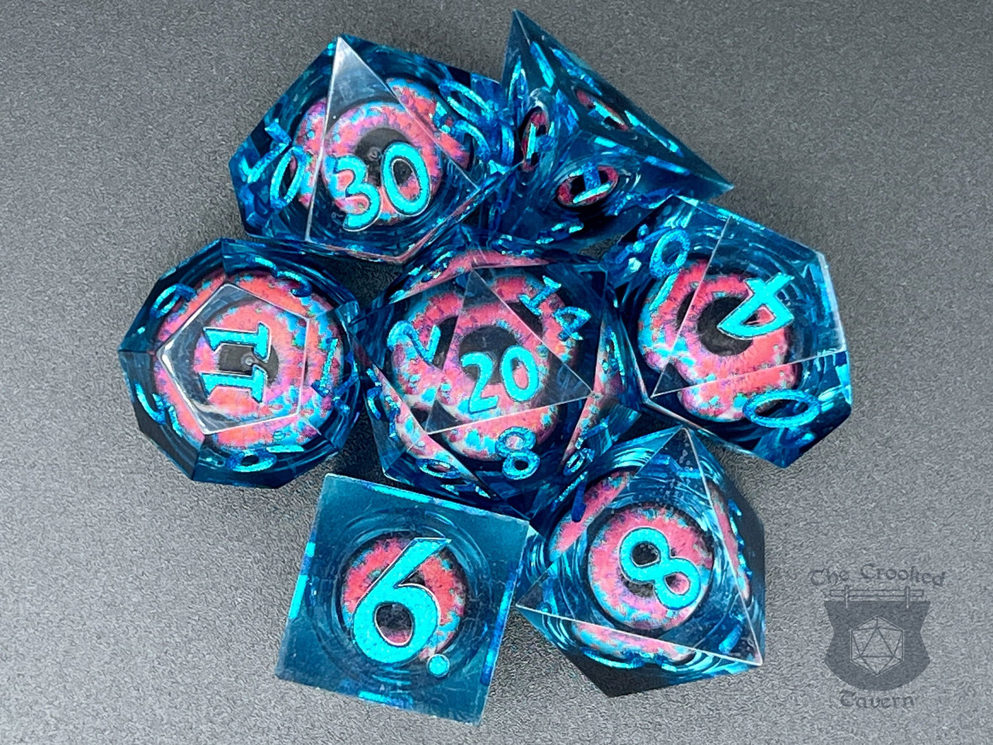 The Crooked Tavern Handmade Dice Sets Floating Eyeball Liquid Core RPG Dice Set | Blue/Pink Eye