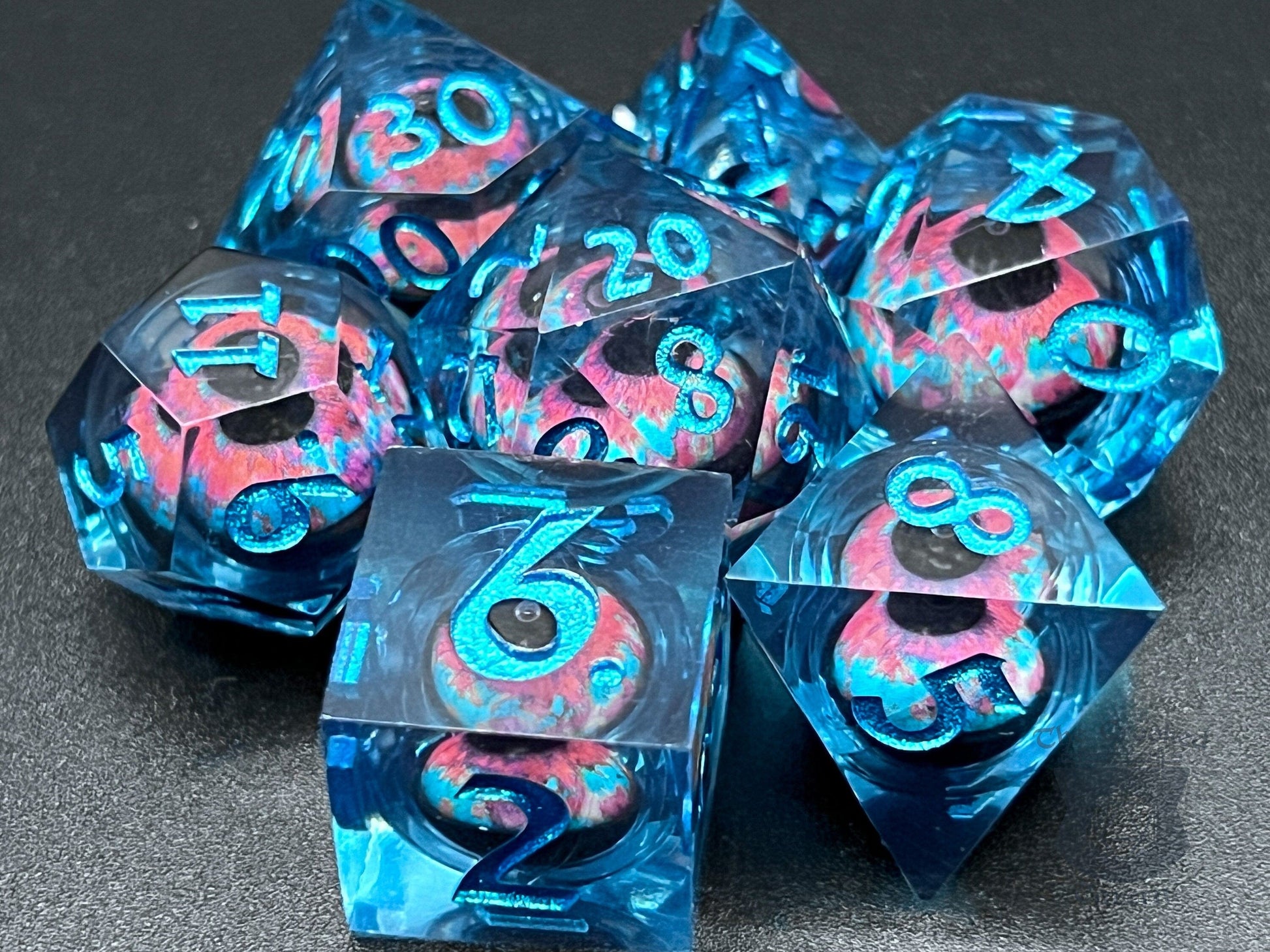 The Crooked Tavern Handmade Dice Sets Floating Eyeball Liquid Core RPG Dice Set | Blue/Pink Eye