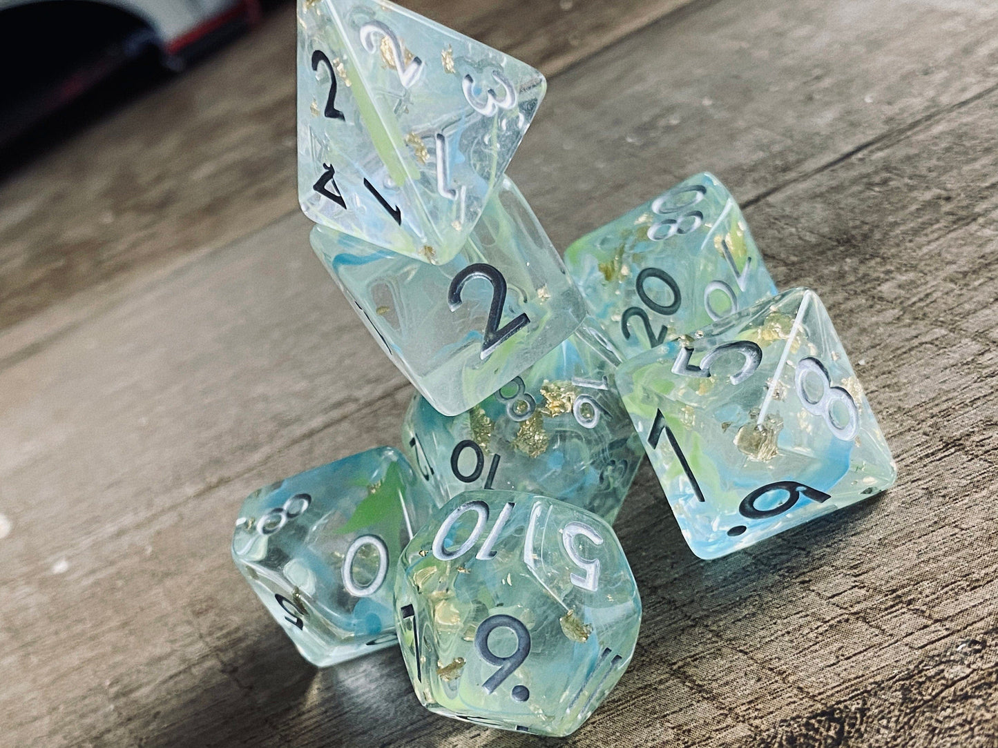 The Crooked Tavern Dice Sets Flotsam RPG Dice Set | Swirling Aqua Colors with Gold Flakes Inside!