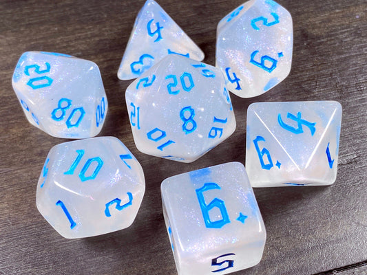The Crooked Tavern Dice Sets Icewind RPG Dice Set | White Sparkles with Blue Font!