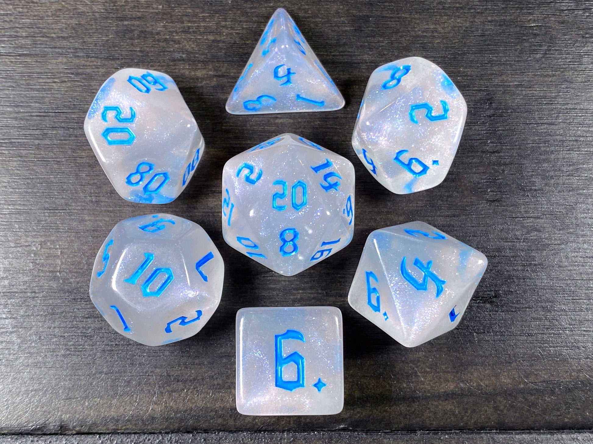 The Crooked Tavern Dice Sets Icewind RPG Dice Set | White Sparkles with Blue Font!