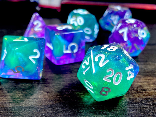The Crooked Tavern Dice Sets Poison Trap RPG Dice Set | Green and Purple Swirling Iridescent Sparkles!
