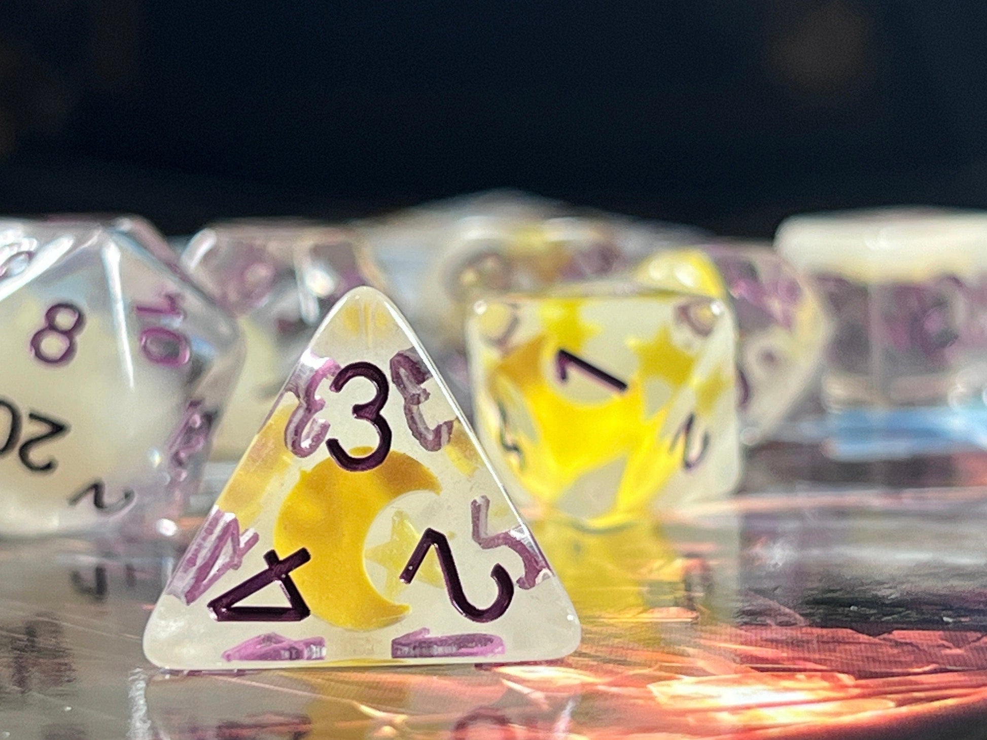 The Crooked Tavern Dice Sets Starry Night RPG Dice Set | Clear Resin with Moons and Stars Inside! (GLOW IN THE DARK!)