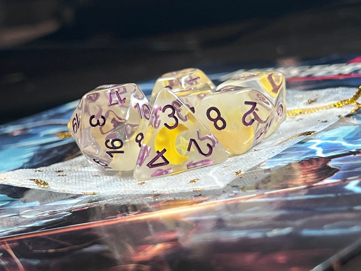 The Crooked Tavern Dice Sets Starry Night RPG Dice Set | Clear Resin with Moons and Stars Inside! (GLOW IN THE DARK!)