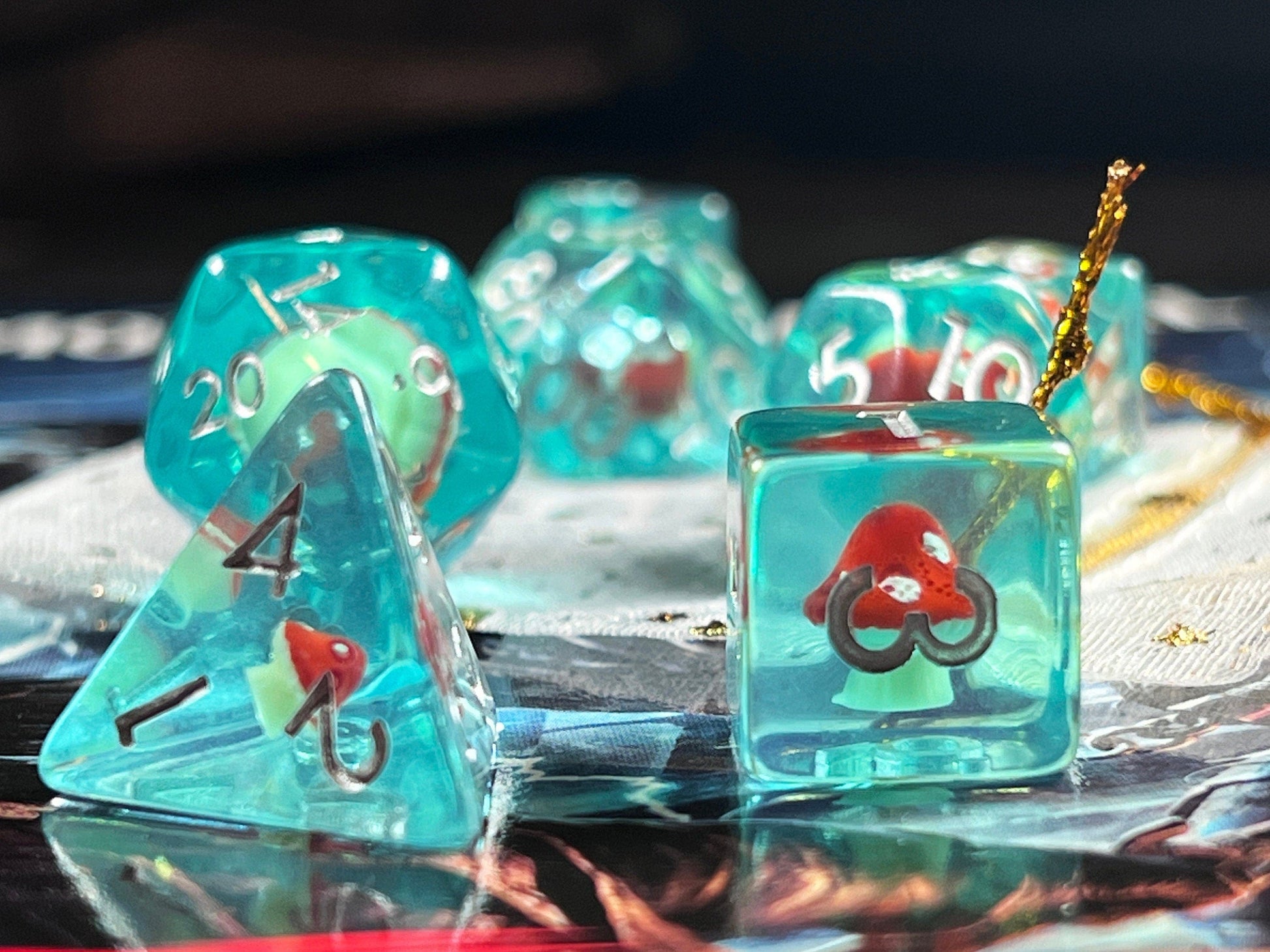 The Crooked Tavern Dice Sets Toadstool RPG Dice Set | Blue Resin with a toadstool inside!